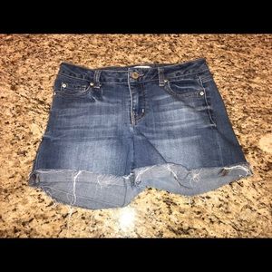 Frayed blue jean shorts